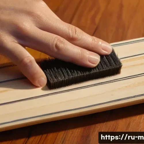 기타 핑거보드 관리 - A close-up scene of a person gently cleaning a guitar fingerboard made of rosewood with a soft micro...